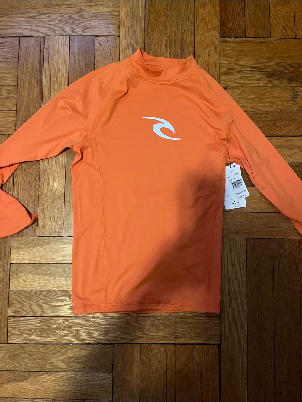 NWT size 14 - Rip Curl Orange Kids Long-Sleeve Rash Guard - UPF 50
